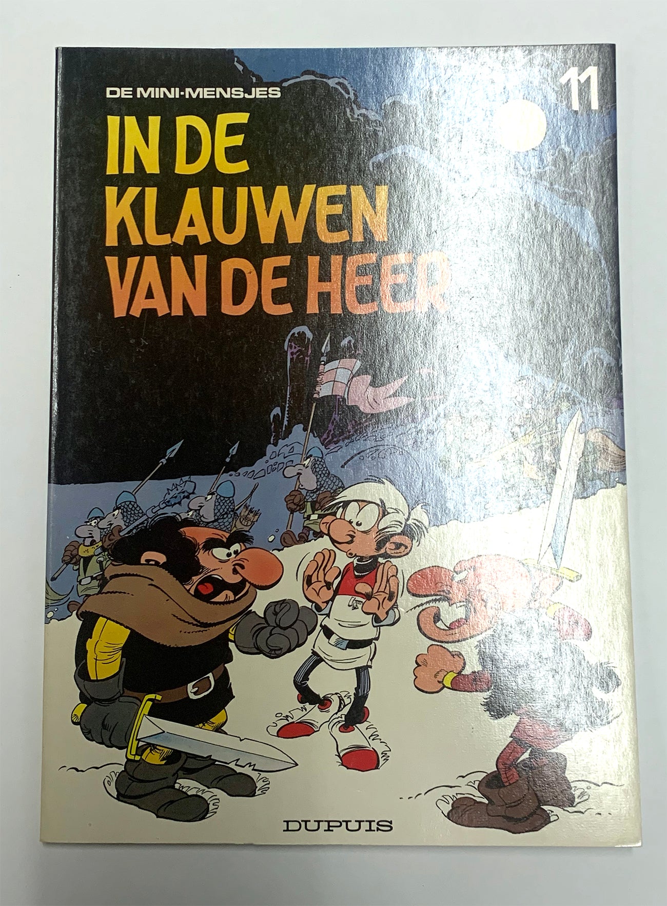 De mini-mensjes, In de klauwen van de heer, nummer 11